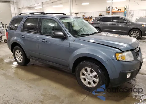 2010 Mazda Tribute I z USA, uszkodzony, nr VIN 4F2CY0C76AKM06448